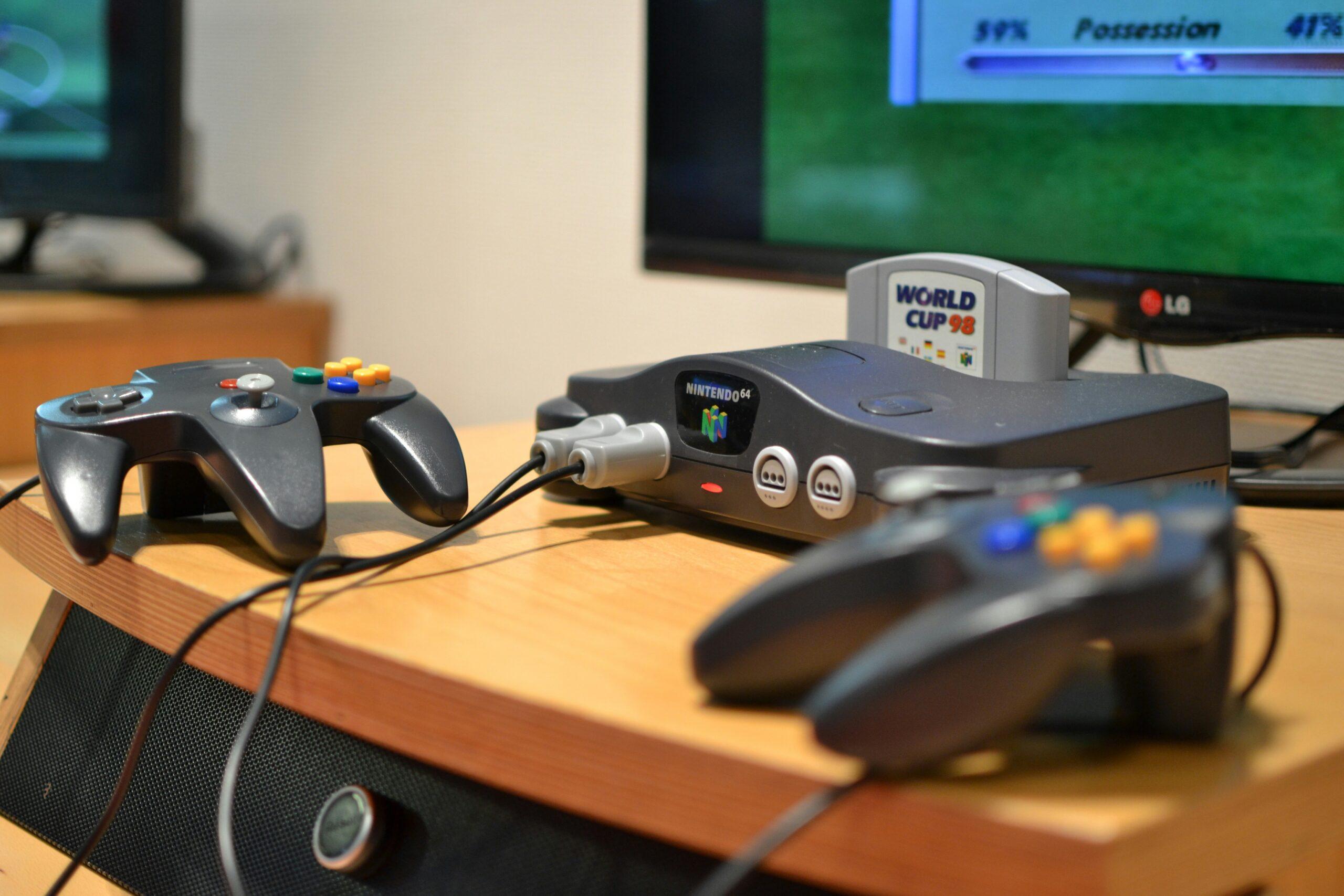 Nintendo 64 Game console with two controllers.
